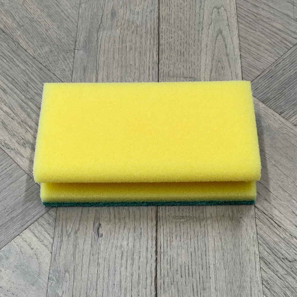 Padschwamm mit grünem Pad Padschwamm mit grünem Pad