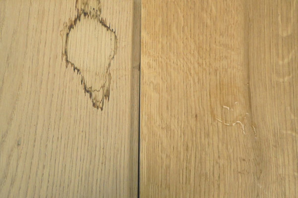 Wasserfleck auf Parkettboden aus Eiche Wasserfleck auf Parkettboden