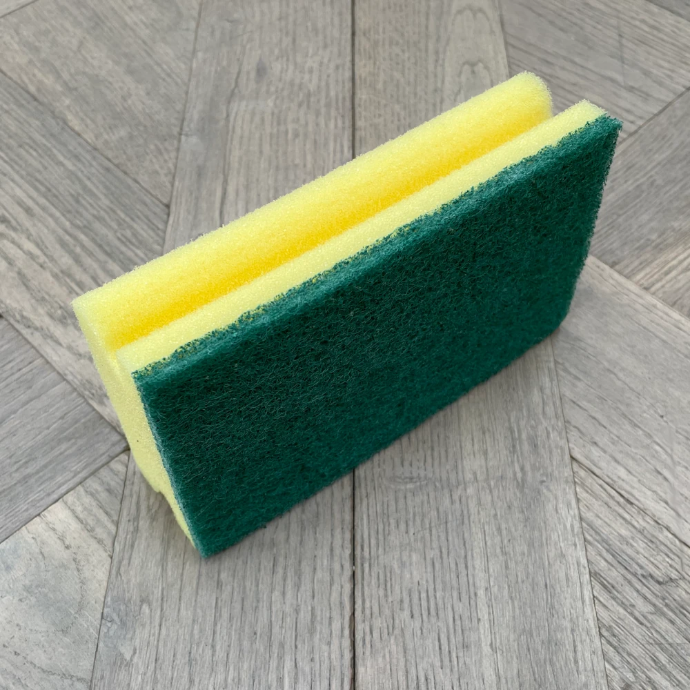 Padschwamm mit grünem Pad Padschwamm mit grünem Pad